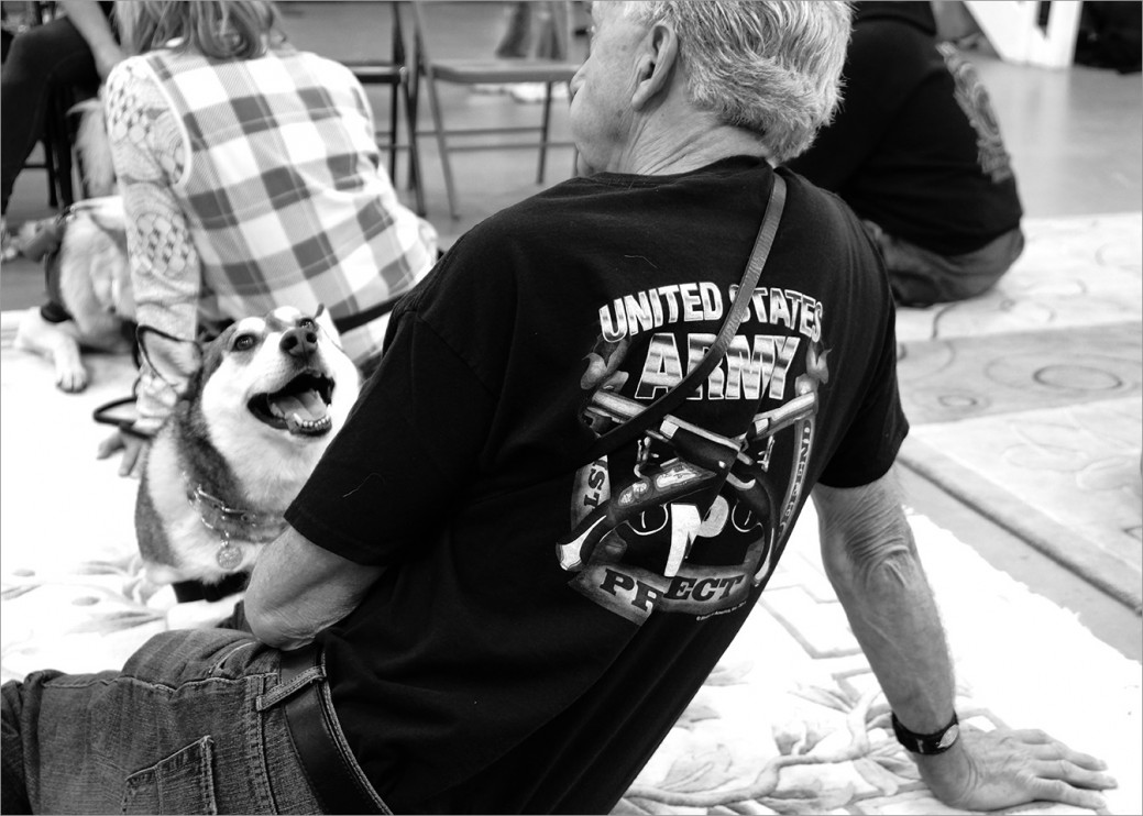 Vietnam Veteran Marv Lewis with his service dog Kairu who never fixes her attention elsewhere. When Marv is feeling uncomfortable in a crowd, Kairu will “block” (create a barrier) to keep him out of range of people. She also helps with mobility issues due to multiple surgeries from injuries sustained during his military service.